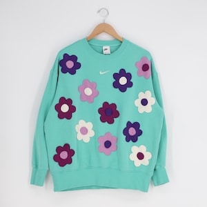 pink and turquoise nike hoodie