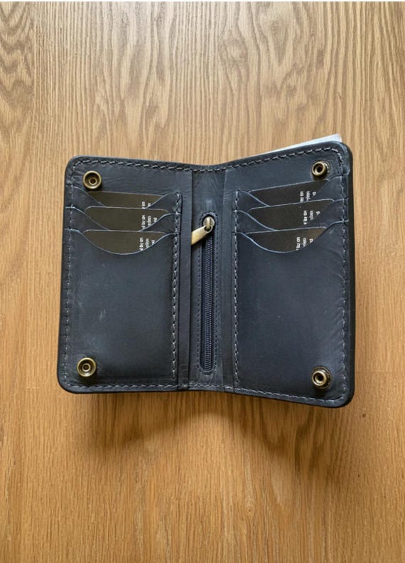 Vintage Cowhide Bifold Wallet with snap closure