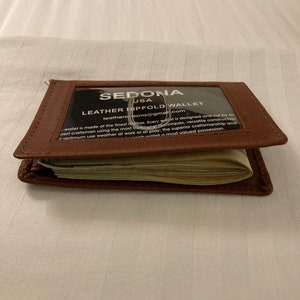 Cartera SEDONA® de una sola pieza con abertura de fuelle en piel de vacuno