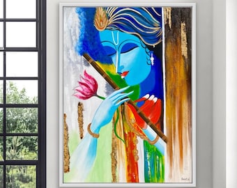 May include: A framed painting depicting a blue-skinned figure with closed eyes, holding a brown flute and a pink lotus flower. The artwork features vibrant splashes of blue, green, orange, and gold leaf accents against a textured background.