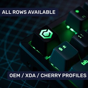 May include: A black mechanical keyboard with green backlighting. The keyboard has a keycap with a green and white logo. The text "ALL ROWS AVAILABLE" and "OEM/XDA/CHERRY PROFILES" is visible on the image.
