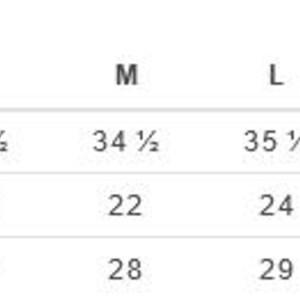 May include: Size chart showing measurements in inches for a garment in sizes XS to 3XL. Measurements include sleeve length, body width, and body length.