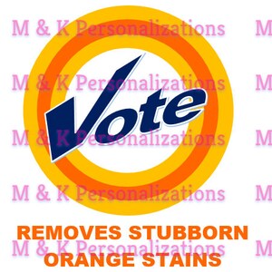 May include: A stylized orange and yellow circle with the word "Vote" in blue lettering inside. The text "REMOVES STUBBORN ORANGE STAINS" is below the circle.