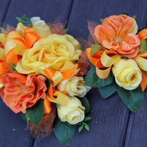 Prom Corsage and Boutonniere Set. Homecoming corsage and boutonniere set. yellow, orange corsage. Bright corsage and boutonniere.