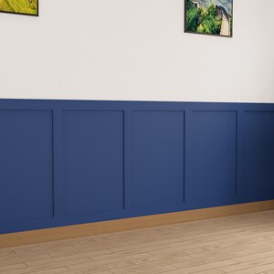May include: A white wall with a blue wainscot paneling. The wainscot is made up of six panels with a wood trim around each panel. The wall is painted white above the wainscot and the wainscot is painted a dark blue. There is a plant in a white pot in the corner of the room.