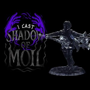 May include: A transparent figurine of a character in action, with a weapon, set against a black backdrop. The text "I CAST SHADOW OF MOIL" is displayed in purple and grey. The figurine is approximately 7.6 cm tall.