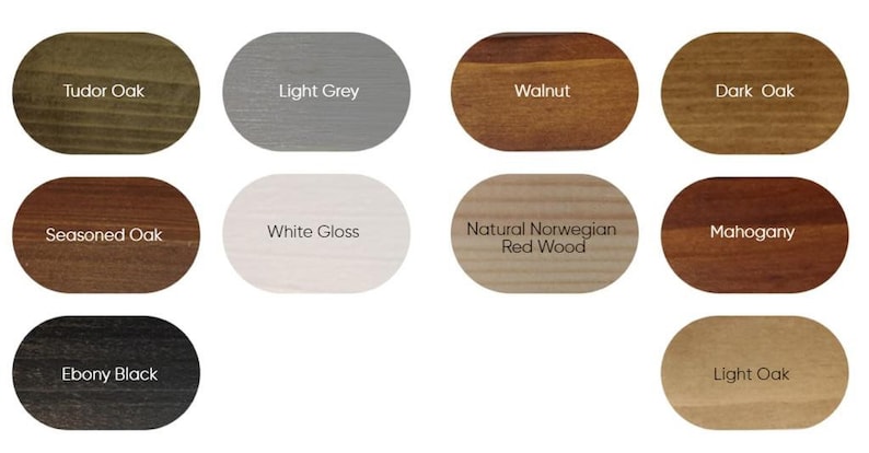 May include: A collection of wood stain color samples in oval shapes. The colors include Tudor Oak, Light Grey, Walnut, Dark Oak, Seasoned Oak, White Gloss, Natural Norwegian Red Wood, Mahogany, Ebony Black, and Light Oak.