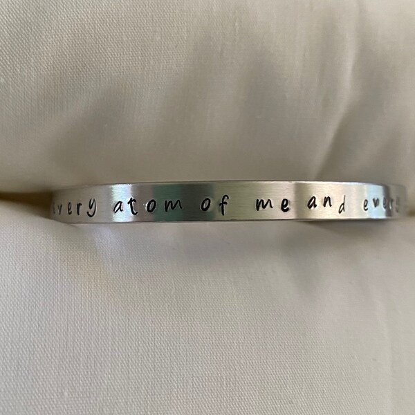 His Dark Materials Bracelet Cuff. Every Atom of me and every atom of you