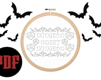 May include: A black and white embroidery pattern featuring a hoop with the text "Dungeon Sweet Dungeon" surrounded by dice and other symbols. The hoop is surrounded by black bats on a white background. The word "PDF" is written in red on a black circle.