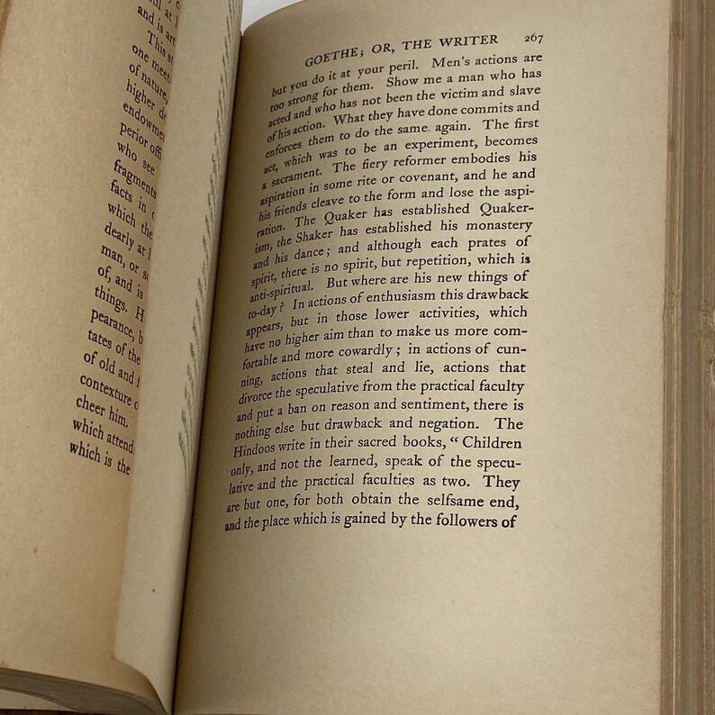 May include: Open book with text on aged paper. The page features the title "GOETHE, OR, THE WRITER" and paragraphs of printed text. The paper has a yellowed hue, suggesting age and use. The book is open to a specific page.