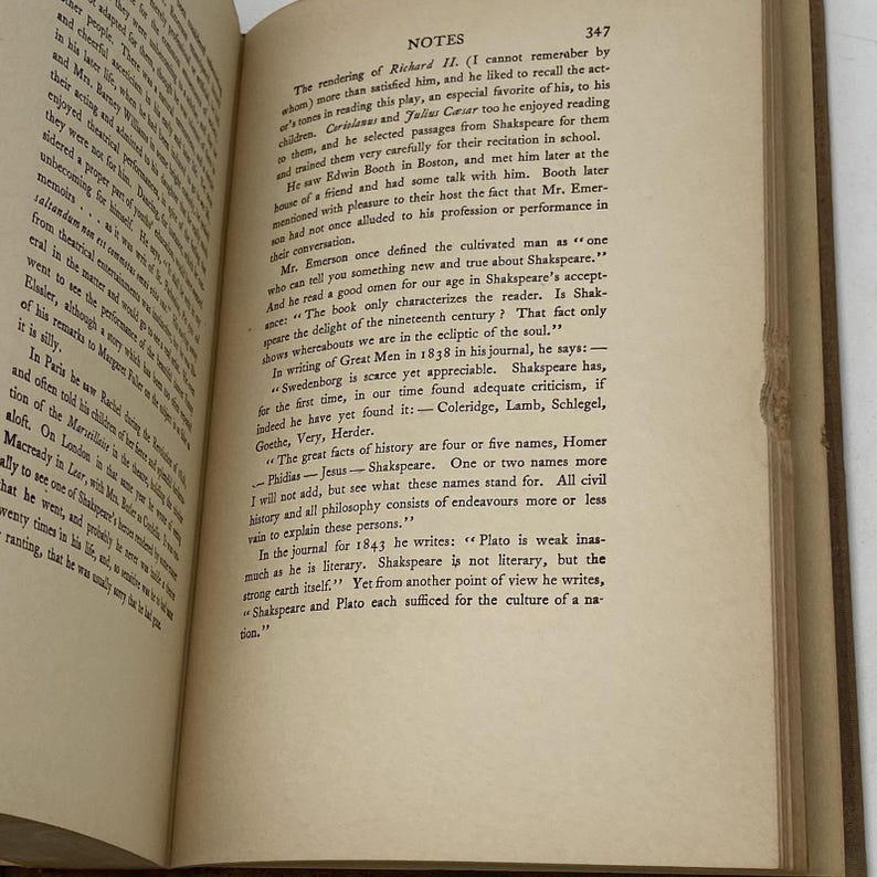 May include: Open book with text on aged paper. The text includes the word "Shakespeare" and other literary references. The pages are yellowed, suggesting age. The book is open to a section titled "NOTES".
