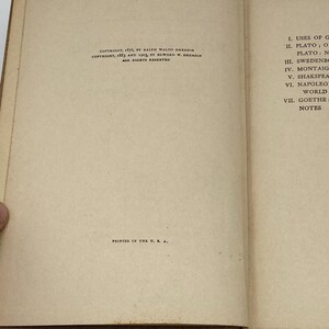 May include: Open book pages with text. The left page has copyright information. The right page lists topics including Plato, Shakespeare, and Goethe. The text is in black font on a beige background. The bottom of the left page reads "PRINTED IN THE U. S. A."