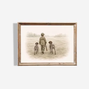 May include: A sepia-toned framed print depicts a young person in camouflage clothing walking through a field, carrying a rifle, followed by two dogs. The dogs are brown and white, and the scene evokes a hunting or outdoor theme.