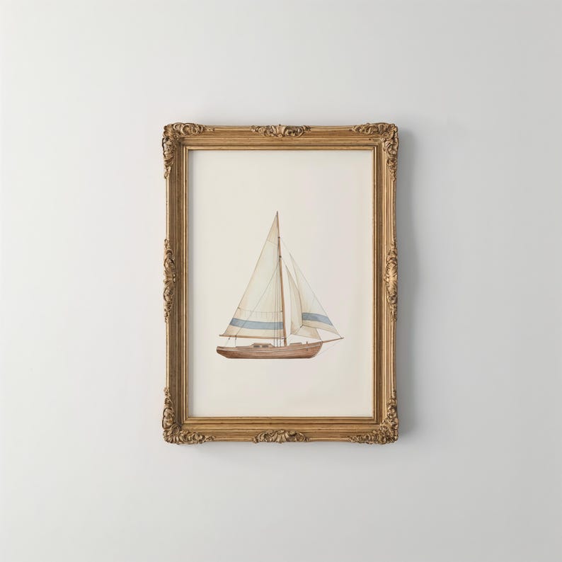 May include: A framed watercolor print of a sailboat. The boat is brown with white sails and blue stripes. The frame is ornate, gold-colored, and rectangular. The artwork is displayed against a white background.