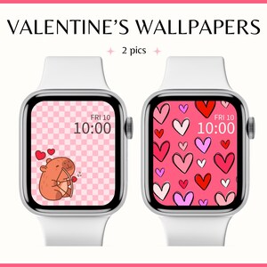 May include: Two Apple Watch faces, one with a pink background and hearts of various sizes and colors, and the other with a pink and white checkered background and a cartoon capybara holding an arrow. Both faces display the time as "FRI 10 10:00".