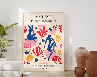 May include: A poster with a colorful abstract design featuring cut-out paper shapes in shades of red, blue, pink, and yellow. The poster is titled "MATISSE Papiers Découpés" and includes the text "Galerie Berggruen & Cie 1953".