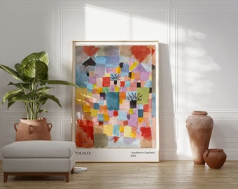 May include: A colorful abstract painting with geometric shapes and a grid pattern. The painting is in shades of red, yellow, blue, green, and purple. The title of the painting is "Southern Gardens 1910" by Paul Klee.