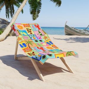 May include: A wooden beach chair with a colorful, patterned fabric seat. The fabric features a patchwork design with summer-themed illustrations, including a sun, lobster, and palm tree. The chair is on a sandy beach with a boat in the background.
