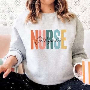Orthopedic Nurse Sweatshirt, Ortho Nurse Sweater, Nursing School Grad, Orthopedics, Ortho Rn, Nurse Squad, Boho Nursing, Grad Gift, Life
