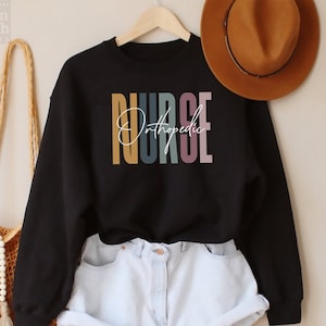 Orthopedic Nurse Sweater, Ortho Nurse Sweatshirt, Ortho Rn, Graduation Grad Gift, Nursing School Student,Nurse Team Squad, Blessed Nurse Mom