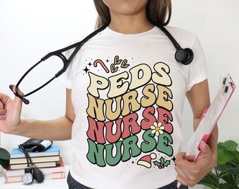 Camicia natalizia per infermiera pediatrica retrò, maglietta natalizia per infermiera pediatrica, maglietta per infermiera pediatrica, squadra squadra, regalo per infermiera per bambini, infermiera carina
