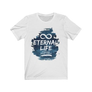 May include: White t-shirt with a blue watercolor design featuring an infinity symbol and the text "Eternal Life Through Jesus Christ".