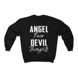 May include: Black sweatshirt with white text that reads "Angel Face Devil Thoughts".