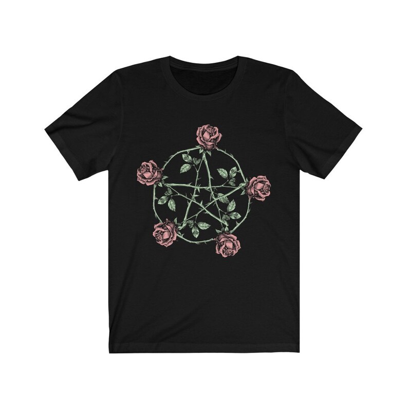 May include: Black t-shirt with a pentagram design made of thorns and roses. The roses are pink and the thorns are green.