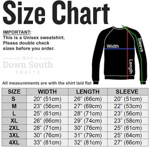 May include: Size chart for a unisex sweatshirt with measurements in inches and centimeters. The chart shows the width, length, and sleeve length for sizes S through 4XL.