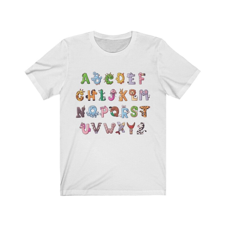 May include: White t-shirt with a colorful alphabet printed on it. Each letter is formed by a different animal.