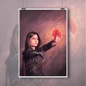 May include: Art print depicting a woman holding a red, glowing orb against a purple and gold backdrop. The artist's signature is visible. The woman is wearing a black jacket and looking upwards.