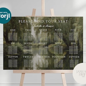 May include: A wedding seating plan with a landscape background, displayed on a wooden easel. The chart includes the text "PLEASE FIND YOUR SEAT" and guest names. The design features the names "Juliette & Romeo".