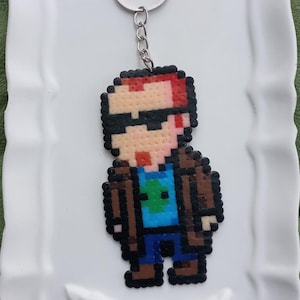 Postal Dude Keychain - Handmade Perler Beads Pixel Art, Retro Gaming Accessory