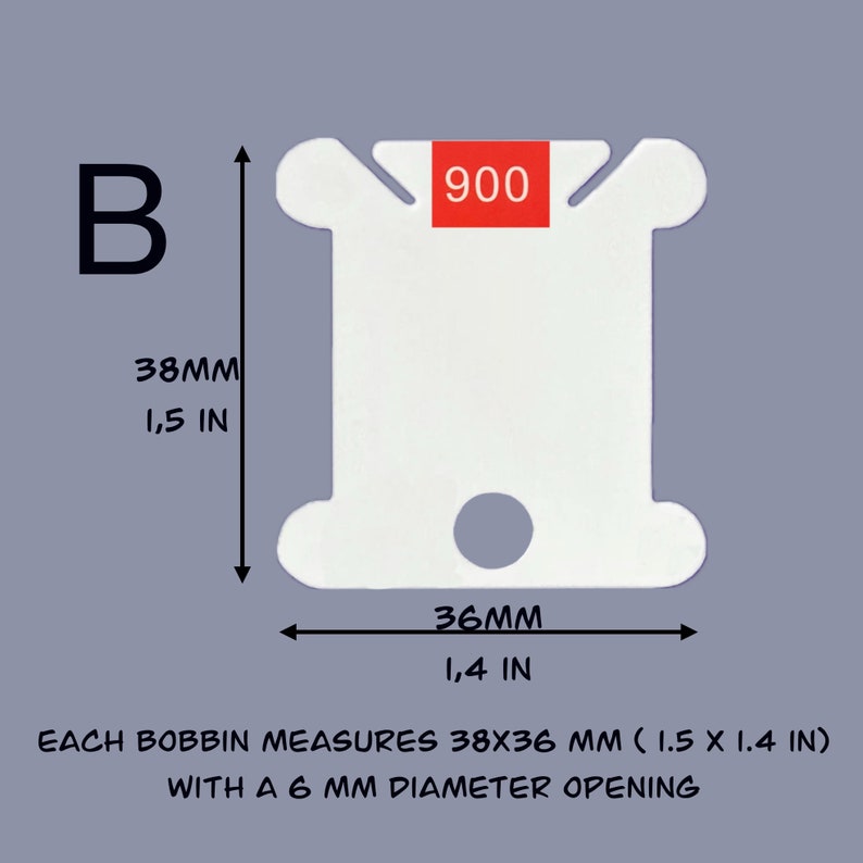 May include: White plastic bobbin with a 6 mm diameter opening. The bobbin measures 1.5 inches by 1.4 inches. The number 900 is printed on the bobbin.