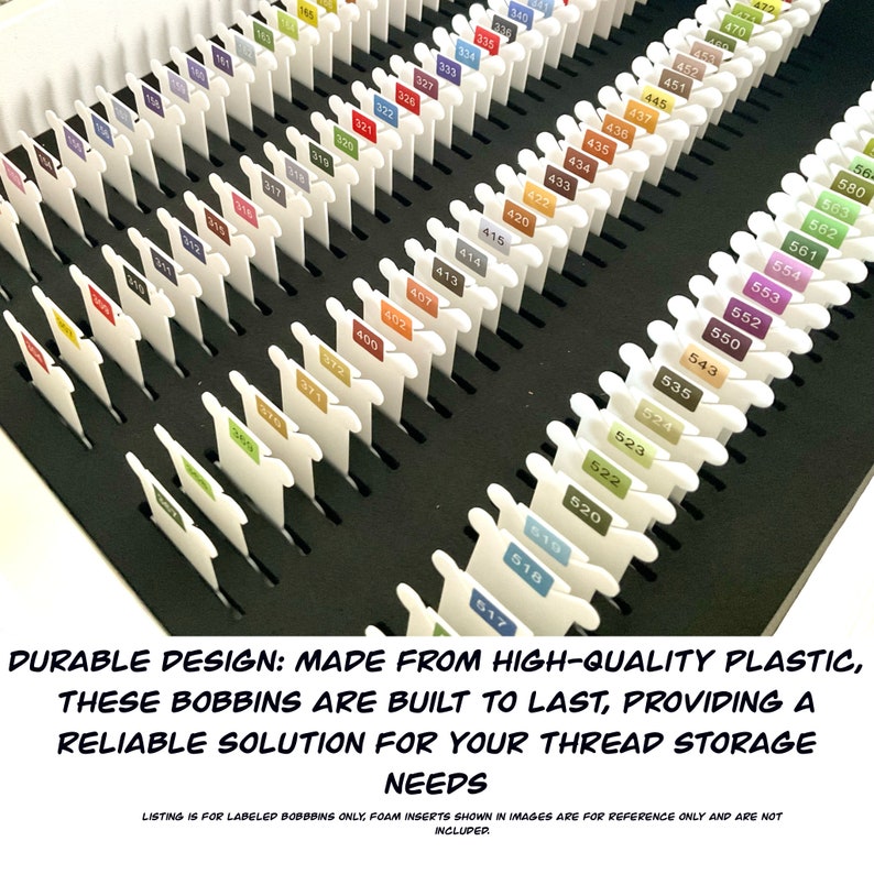 May include: A black plastic storage case with white bobbins labeled with numbers. The bobbins are for storing thread. The case is filled with bobbins, and the numbers on the bobbins range from 56 to 619.  Durable design: Made from high-quality plastic, these bobbins are built to last, providing a reliable solution for your thread storage needs. Listing is for labeled bobbins only. Foam inserts shown in images are for reference only and are not included.