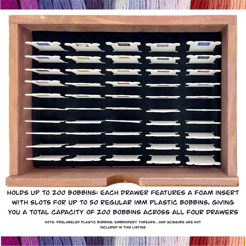 May include: A wooden storage box with four drawers for storing up to 200 embroidery bobbins. Each drawer has a foam insert with slots for up to 50 bobbins.  The box is labeled "HOLDS UP TO 200 BOBBINS: EACH DRAWER FEATURES A FOAM INSERT WITH SLOTS FOR UP TO 50 REGULAR IMM PLASTIC BOBBINS, GIVING YOU A TOTAL CAPACITY OF 200 BOBBINS ACROSS ALL FOUR DRAWERS".  The text "NOTE: PRELABELED PLASTIC BOBBINS, EMBROIDERY THREADS, AND SCISSORS ARE NOT INCLUDED IN THIS LISTING" is also visible.
