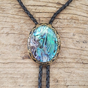 Bolodas met abalone schelp: gouden western-cowboystropdas