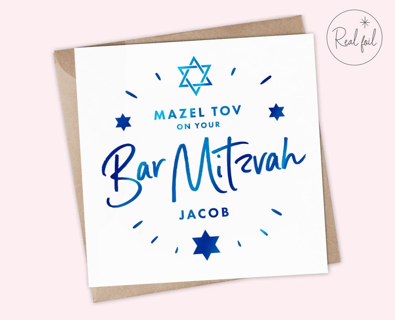 May include: A white card with a blue and white star of David design. The text reads "Mazel Tov on your Bar Mitzvah Jacob".