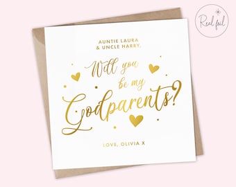 May include: A white card with gold foil lettering that says "Auntie Laura & Uncle Harry, Will you be my Godparents? Love, Olivia X".