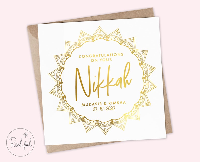 May include: A white card with a gold mandala design and the text "Congratulations on your Nikkah Mudasir & Rimsha 10.10.2020".