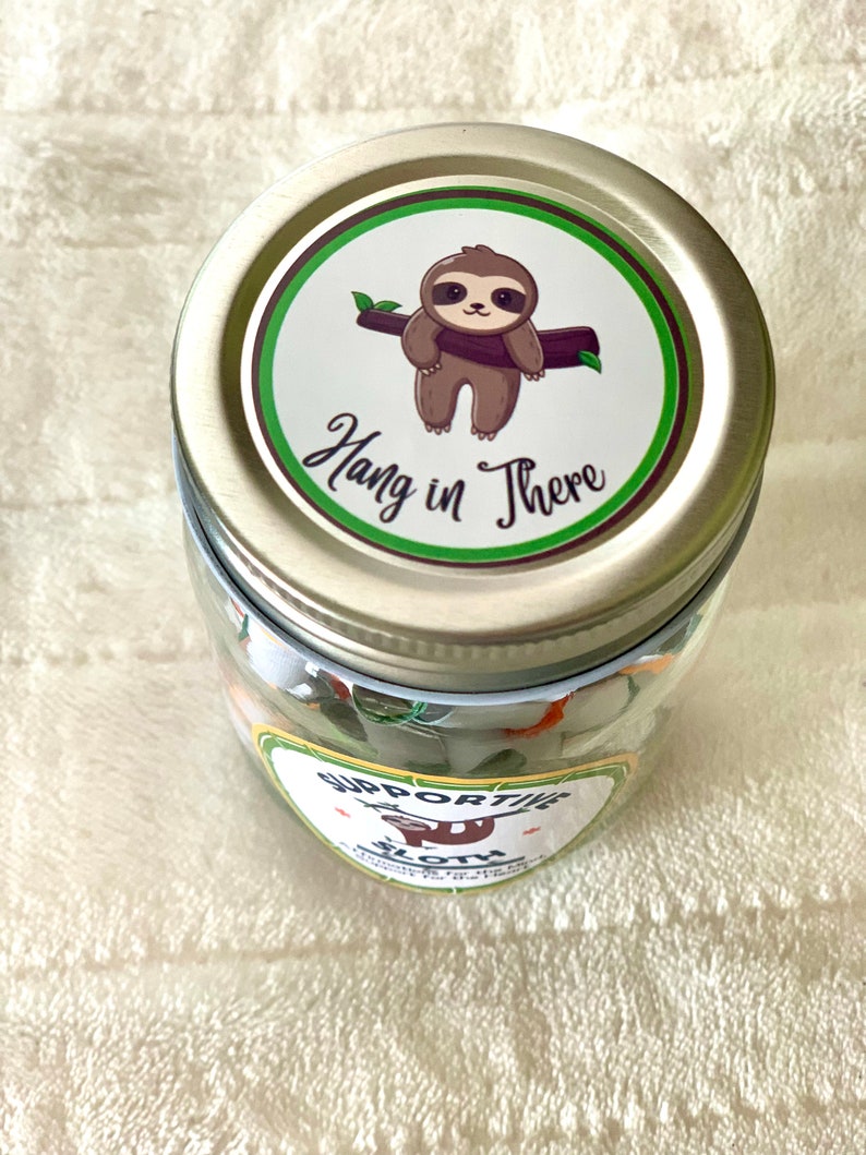 Affirmation Jar top saying “hang in there”. Affirmations for support and difficult times.