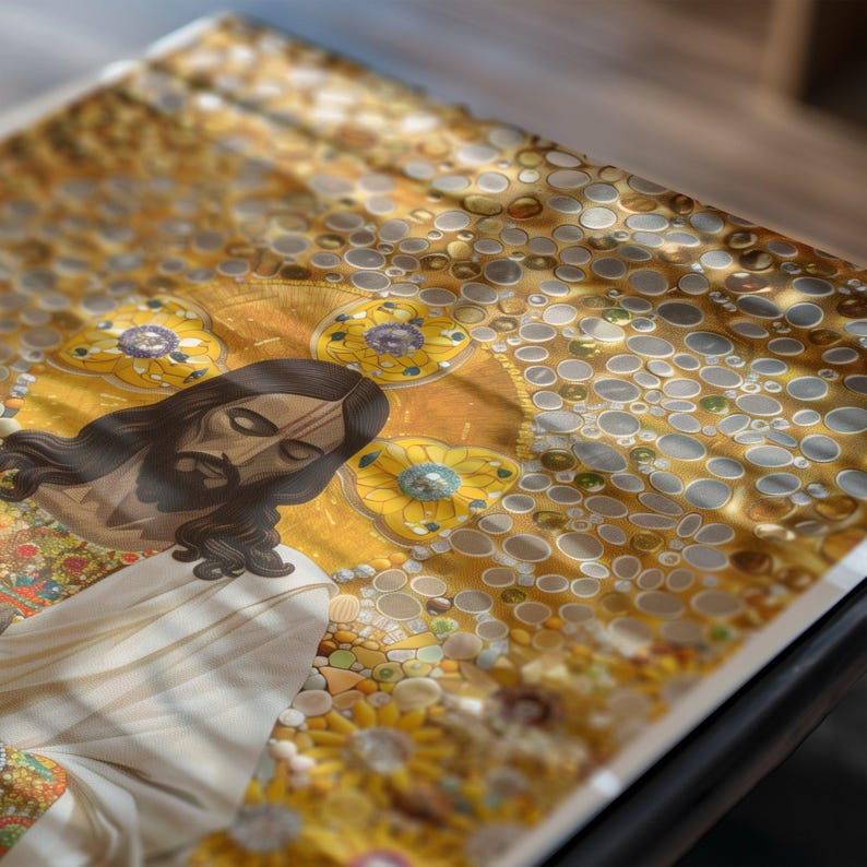 May include: A close-up of a mosaic artwork depicting Jesus Christ. The artwork is made of small, colourful tiles and features a gold background. The image is framed and displayed on a table.