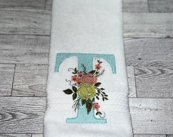 Monogrammed washcloth. Initial hand towel