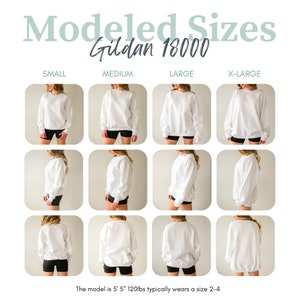 May include: A model wearing a white Gildan 18000 sweatshirt in sizes small, medium, large, and x-large. The model is 5'5" and 120lbs. The model is wearing black shorts.