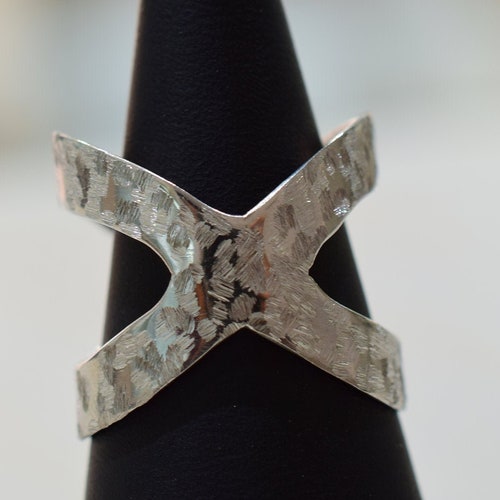 Metal ring with matt finished details shops made from solid sterling silver.