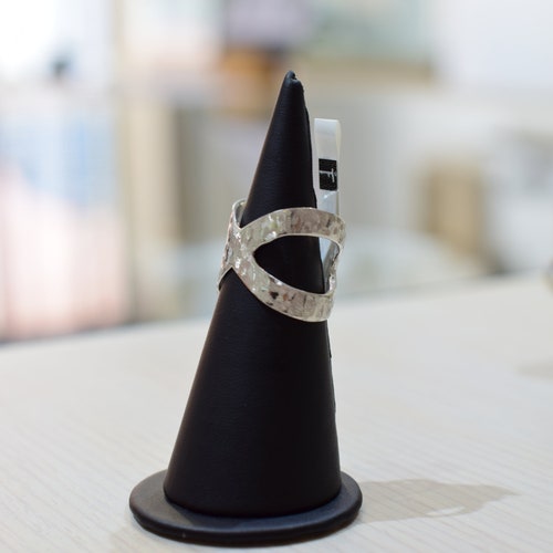 Metal ring with matt finished details shops made from solid sterling silver.