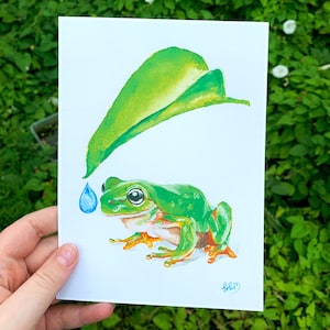 Stampa acquerello rana - carina rana verde seduta sotto la foglia, arte della parete di carta A5, Frogcore, Cottagecore, Goblincore, Hobbitcore, accogliente