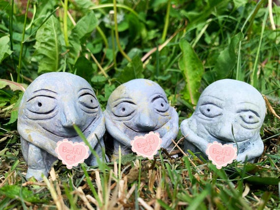A hand-sculpted Sheela na Gig — the ancient, unapologetically weird Irish grotesque figure — is legitimately rare folk art you won't find at any gift shop.