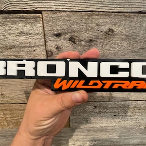NEW &quot;WILDTRAK&quot; White upper with Orange lower letters on black background, (MANY Colors Available!!!)