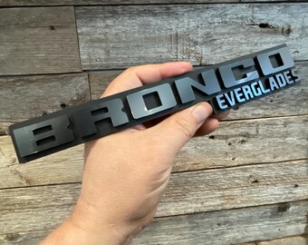 Everglades Blackout Matte Black Background Gloss Gunmetal Black Letters Acrylic Badge.